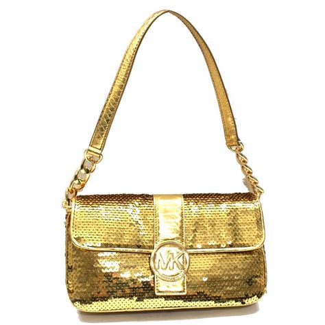 michael kors bags with jewelly|Michael Kors gold evening bag.